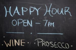 Happy hour sign in chalk