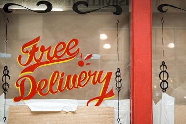 Free delivery windows sign for beer or alcohol