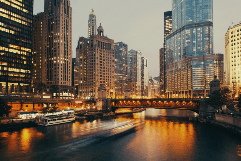 Chicago bridge over river at night