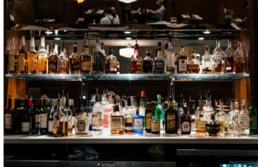 liquor bottles on bar shelf
