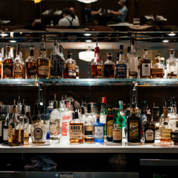 liquor bottles on bar shelf