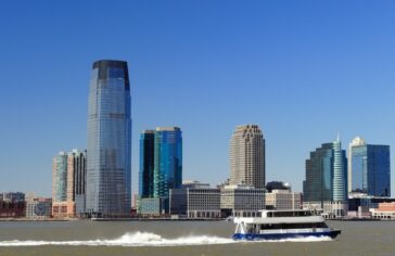 ferry and New Jersey skyline during the day