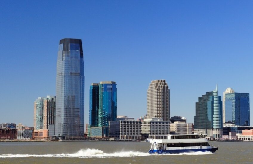 ferry and New Jersey skyline during the day