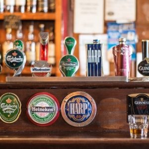 beer taps at wooden countertop bar