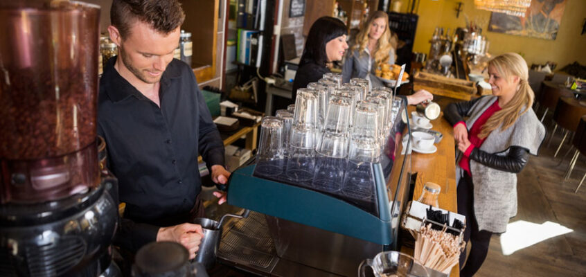 Bartender Working At Counter