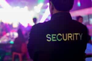 security person watching nightclub crowd