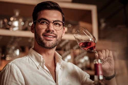 a California bartender tasting wine who is California RBS certified