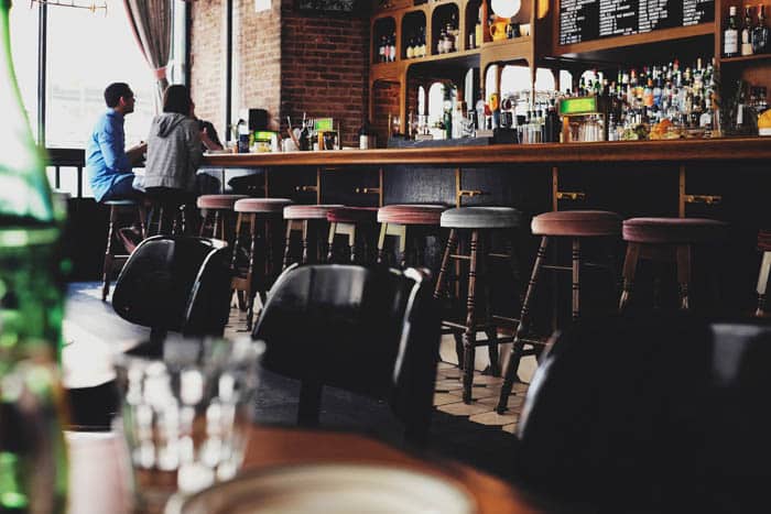 Bar in restaurant with stools for customers