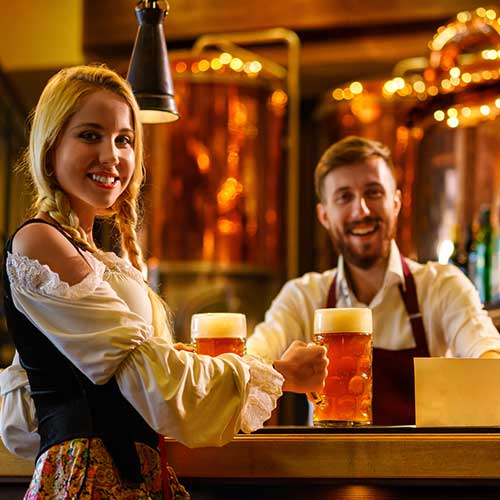 young waitress and bartender at the counter